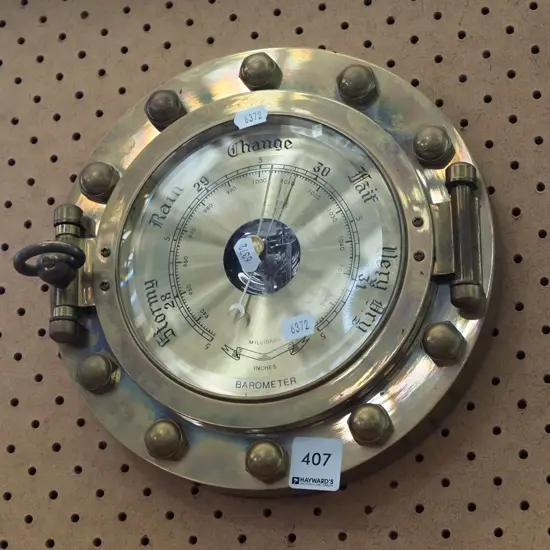 nautical port hole wall clock