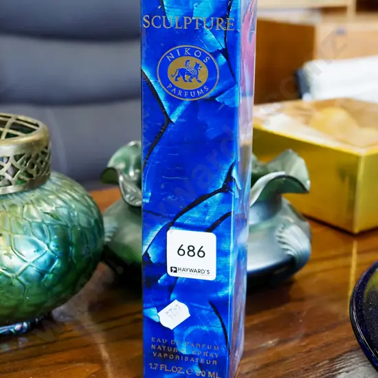 bottle of Nikos parfum sculptor perfume