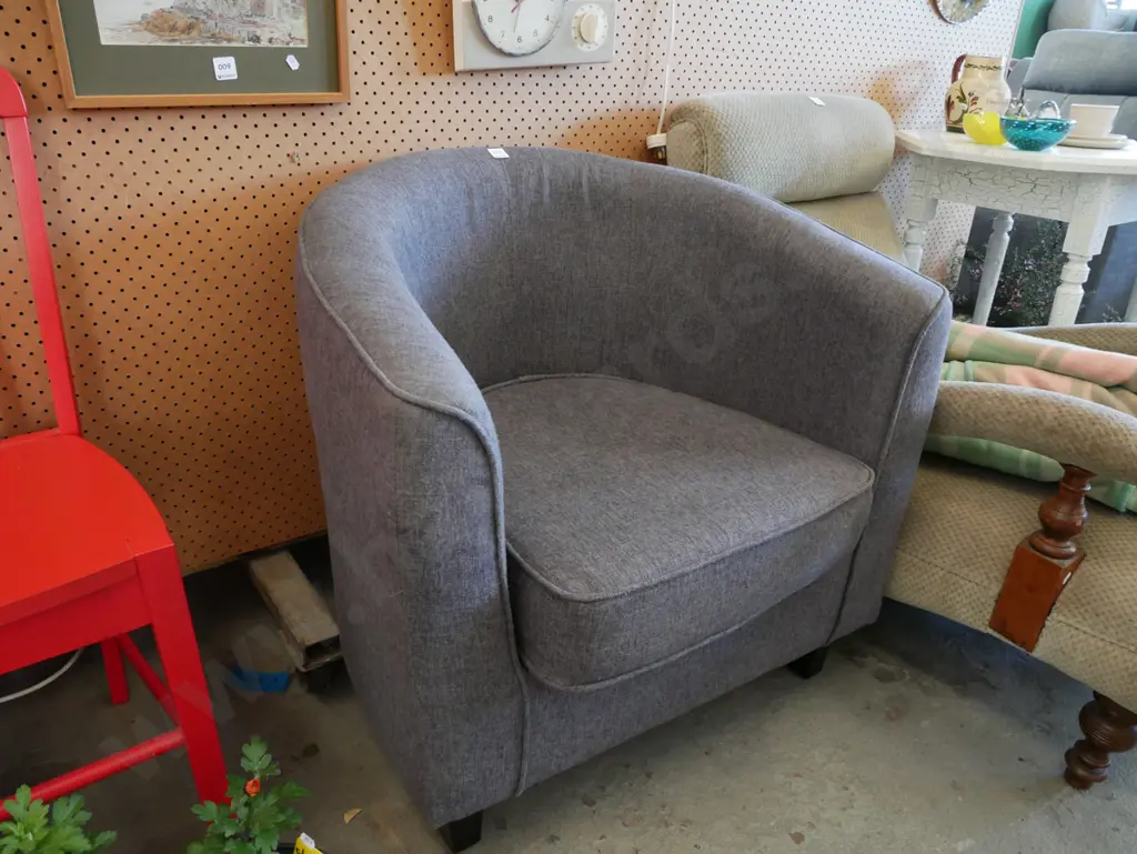 grey upholstered tub chair Image 1++