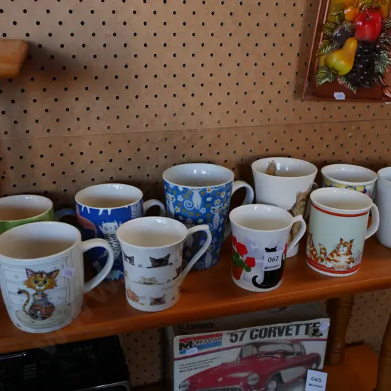 assorted cat themed coffee cups