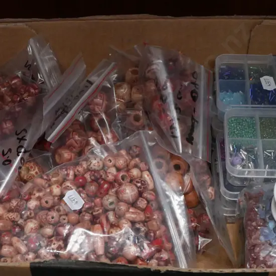 box of crafter's beads, stones