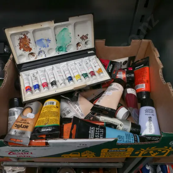box of acrylic and watercolour paints