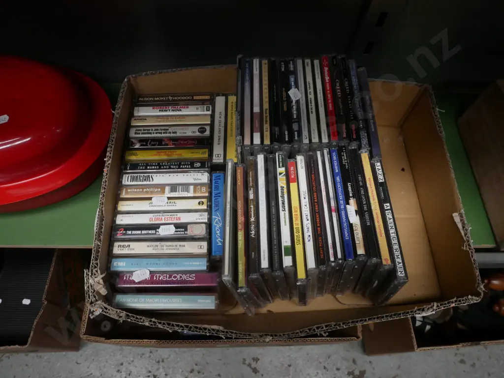 box of CDs and cassette tapes Image 1++