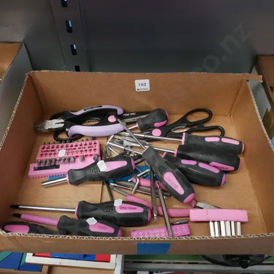 box; pink handled tools