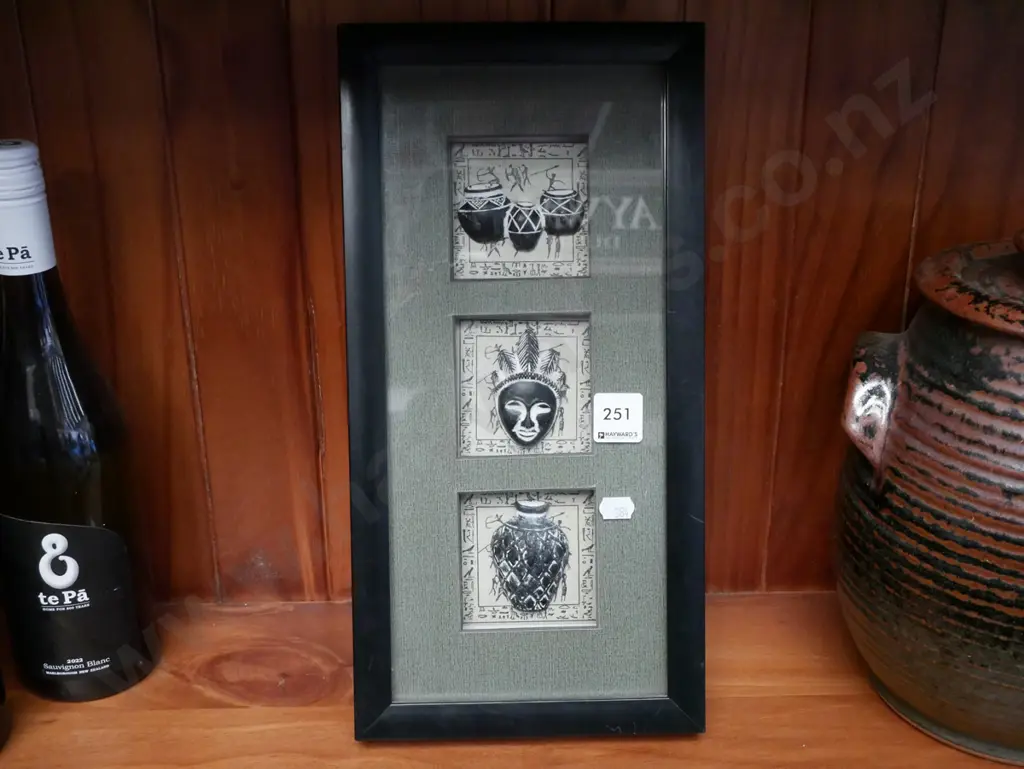 framed ethnic themed faces and pots Image 1++