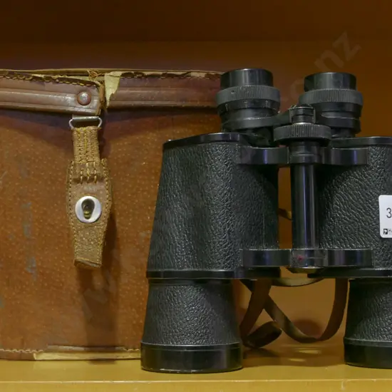 leather cased 10x50 Omega binoculars
