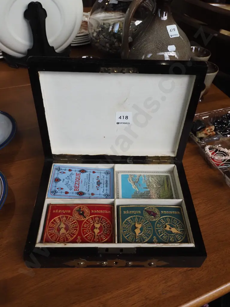 small wooden roll top box with brass crucifix on top; Bezique scorers, cards etc Image 1++