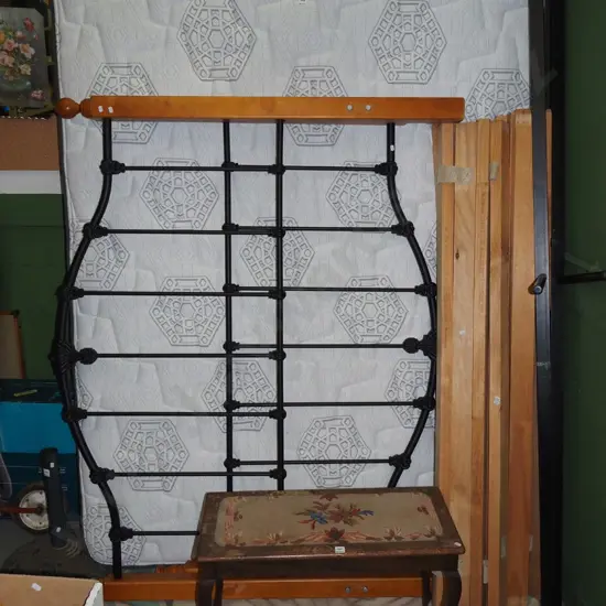 queen bed base and mattress with cast brass and wood head and foot boards