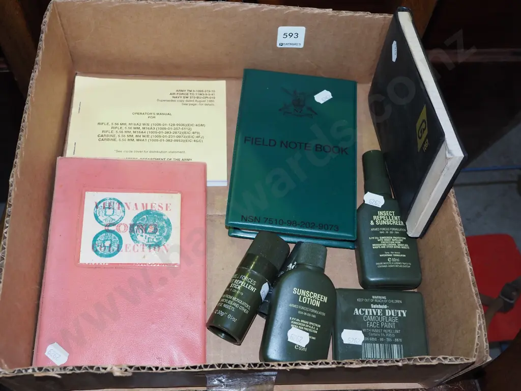 box; military sunscreen, notebooks, operations manuals, Vietnamese coin collection Image 1++