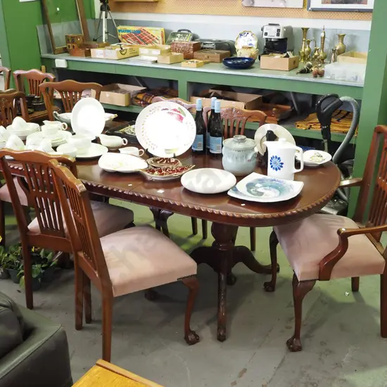 mahogany extending twin pedestal rope edged dining table with 6 matching 
