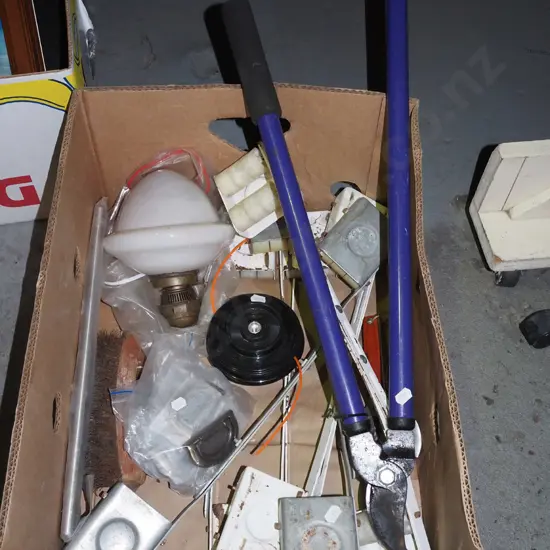 box; garden loppers, line trimmer heads, furniture casters etc
