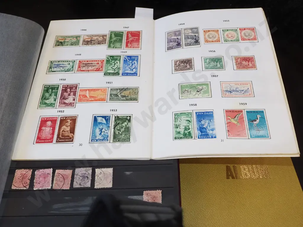 3x stamp albums Image 1++