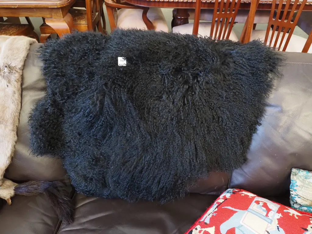 2x black woollen sheepskins Image 1++