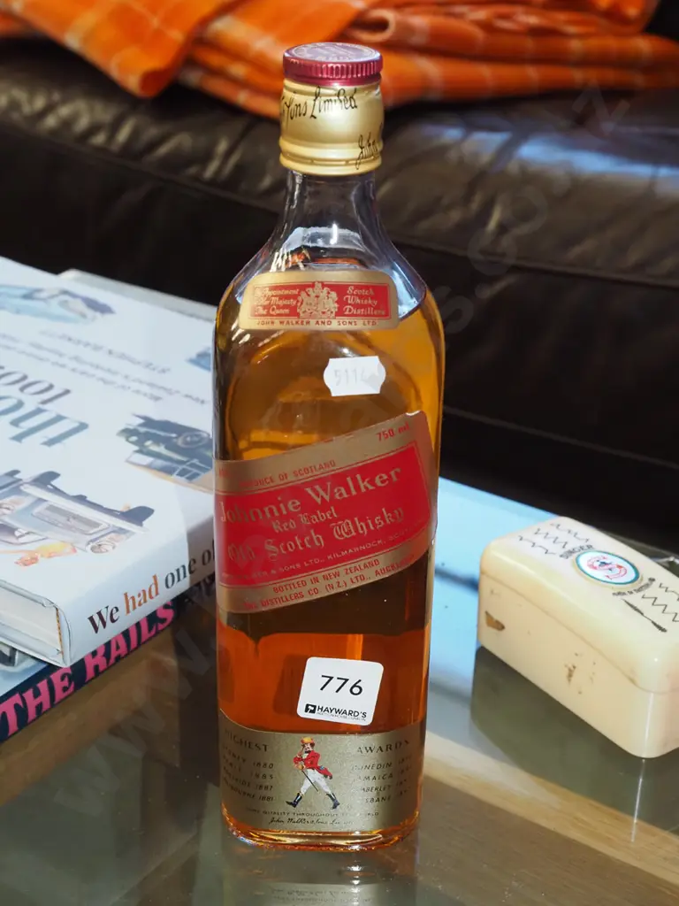 bottle of Johnnie Walker red label 750ml Scotch whisky Image 1++