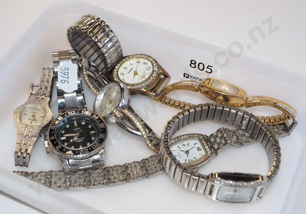 tray of wristwatches Image 1++