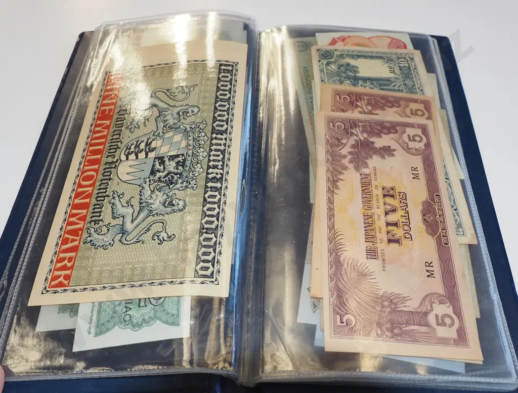 clear folder of bank notes Image 1++