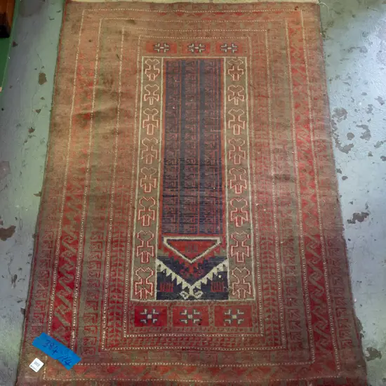 hand knotted wool tribal floor rug in very faded reds and blues - some wear L-1290 W-840
