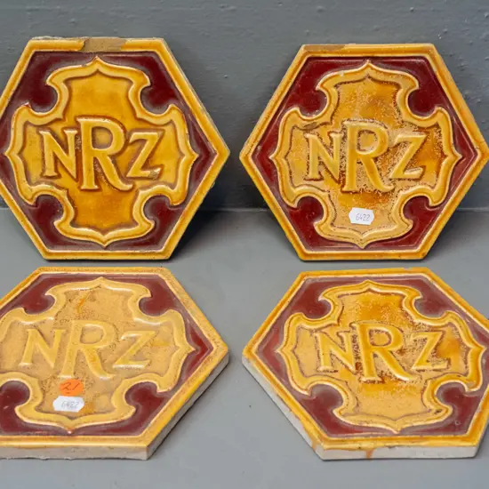 4 NZR New Zealand railway hexagonal ceramic tiles - one has English maker's mark, hard to read. Age wear and crazing, 2