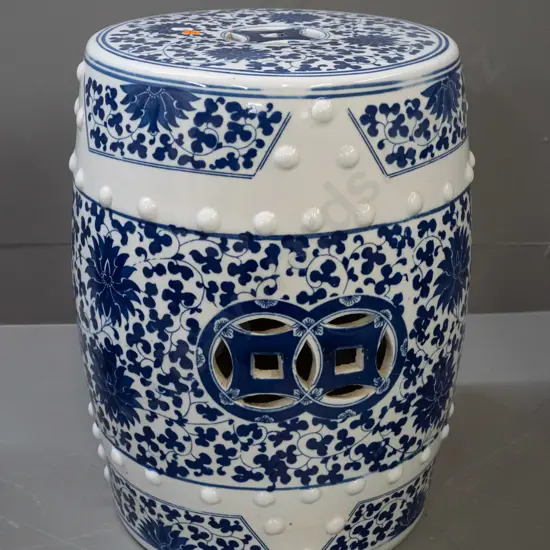 Chinese blue and white ceramic garden seat with pierced cutouts in top and sides, raised stud pattern H-420 D-290 at top