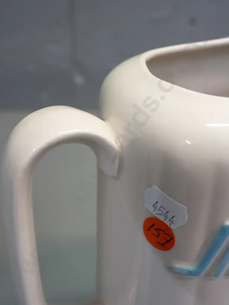 McAlpine refrigerator jug, no maker's marks - small hairline under-glaze flaw and a few spots of blue enamel on handle Image 1++