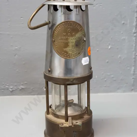 Eccles "Protector Lamp" mining lantern, metal with brass base, glass shade, hanging hook - some corrosion H-250