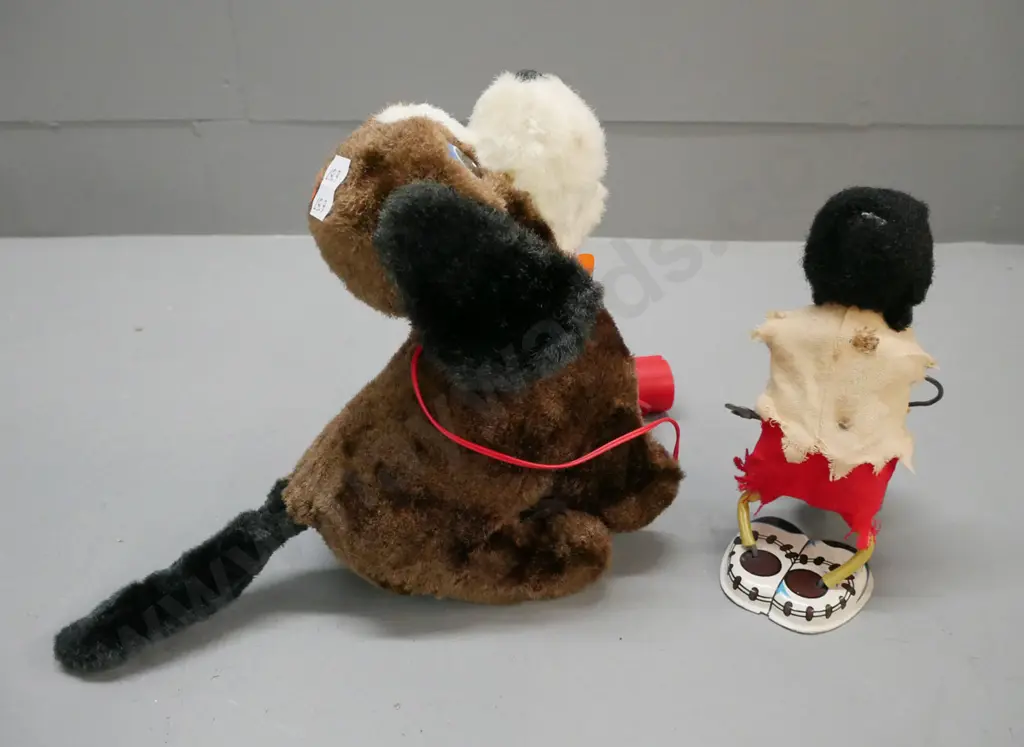 1x battery-powered Japanese vintage acrobat pup; 1x wind-up vintage first nations drummer Image 1++
