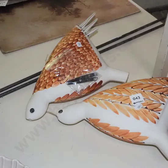 2x garden ornaments - birds on poles