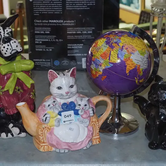 cat and dog themed teapots, small world globe
