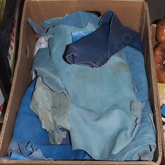 box of leather scraps