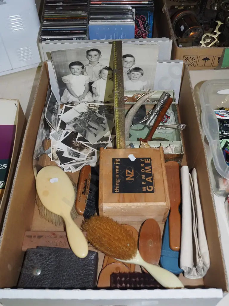 box; vintage photographs, memory game, tins, magnifying glass, brushes, etc Image 1++