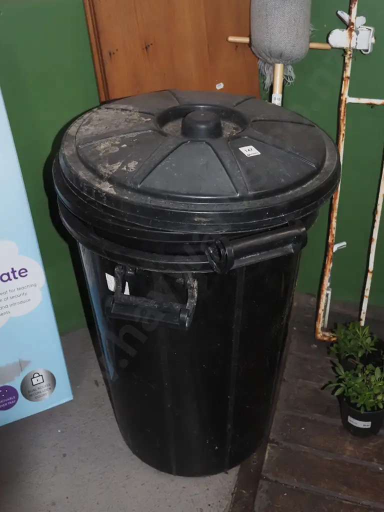 2x black plastic lidded bins Image 1++