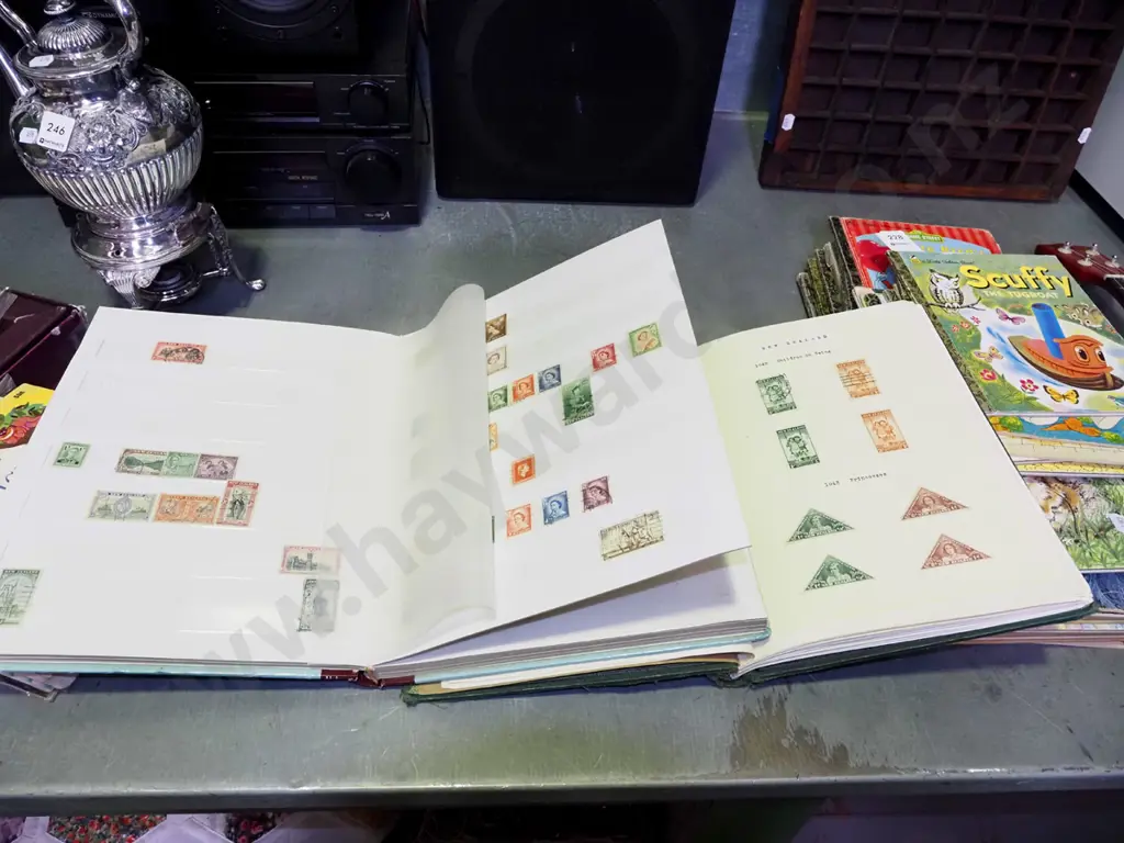 2x stamp albums Image 1++