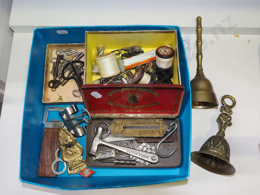 box of brass bells, watch & clock keys, spring scales, sewing machine attachments, etc. Image 1++