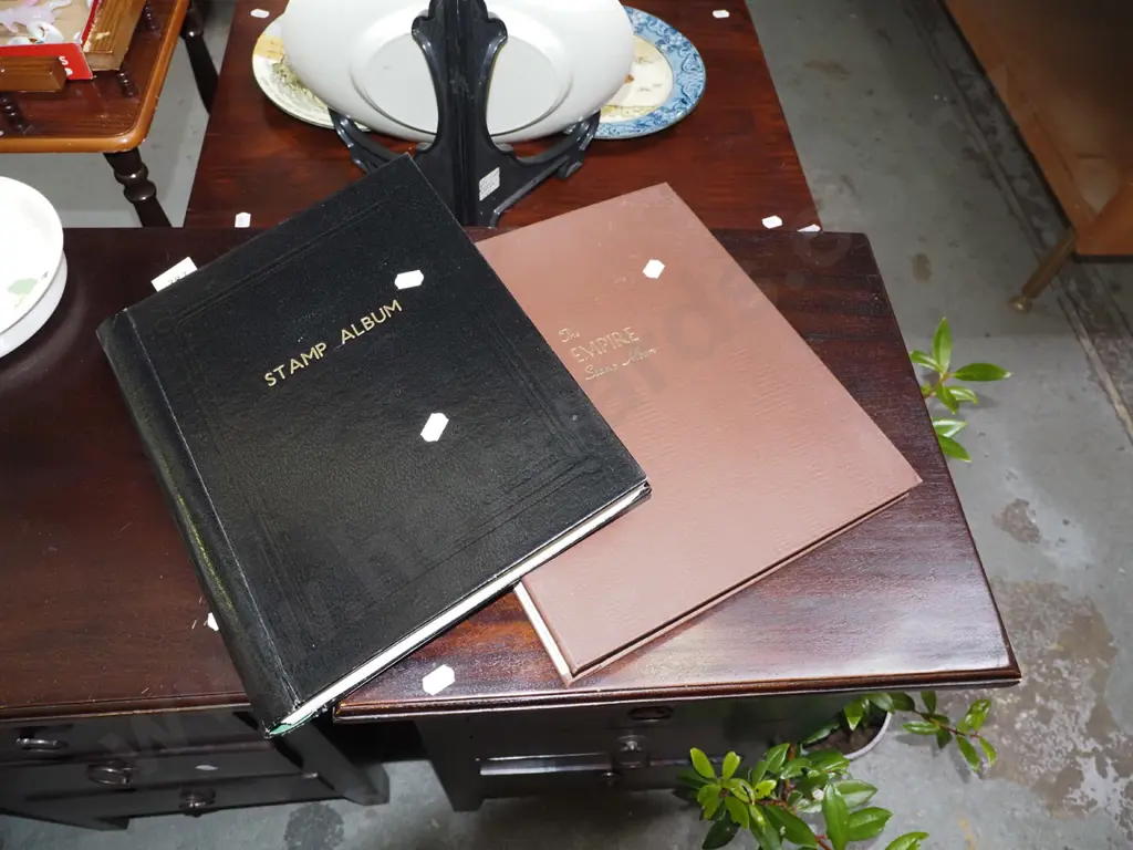 2x stamp albums Image 1++