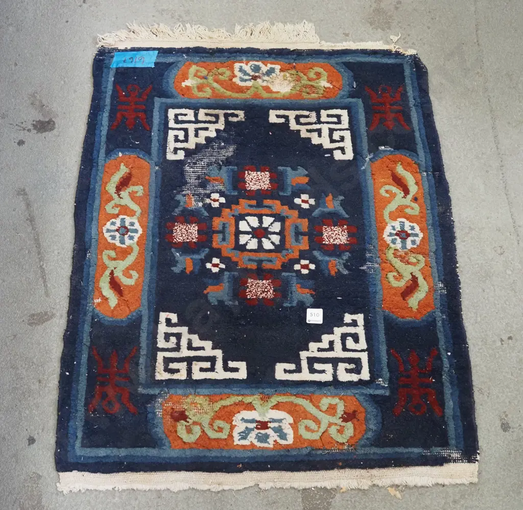 small woollen floor mat - significant wear Image 1++