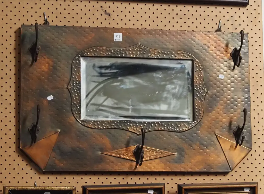 beaten copper hanging coat hooks and wall mirror Image 1++