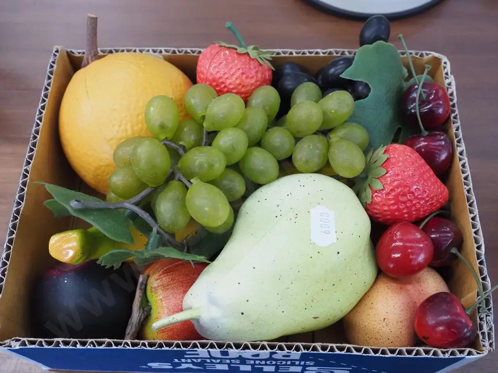 box of plastic  faux fruit Image 1++