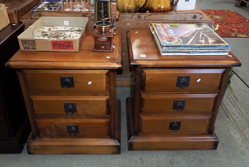 pair of pine 3 drawer bedside cabinets with drop metal  handles Image 1++