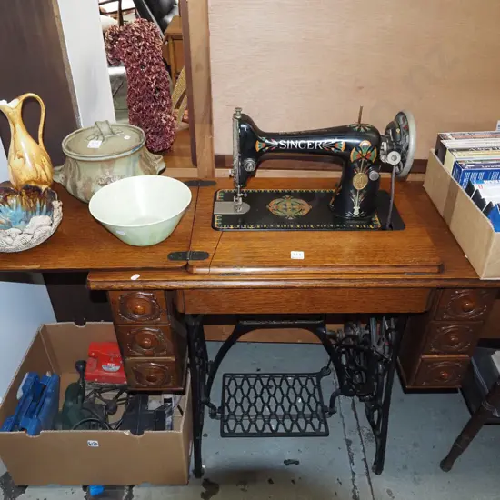 Singer treadle sewing machine in good condition with original belt