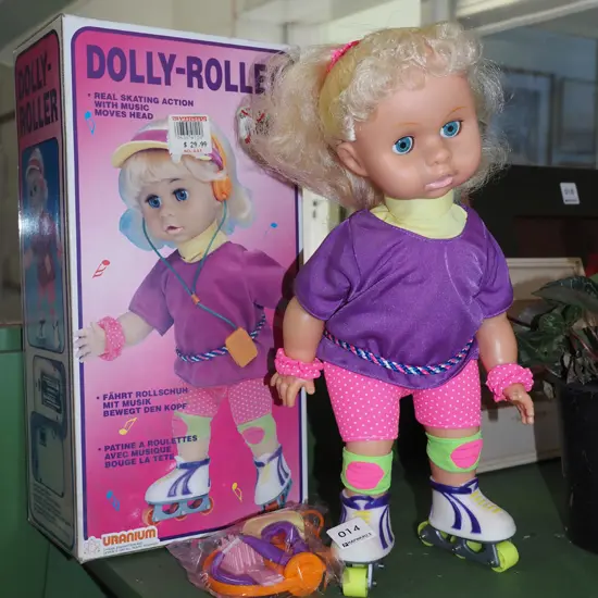 as new boxed 1990s Dolly-Roller doll