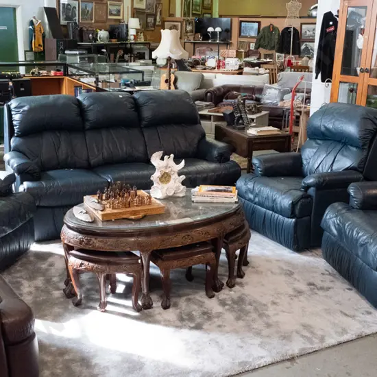 blue leather 4 piece lounge suite - 3 seater and 3x reclining armchairs - 1 chair handle is broken