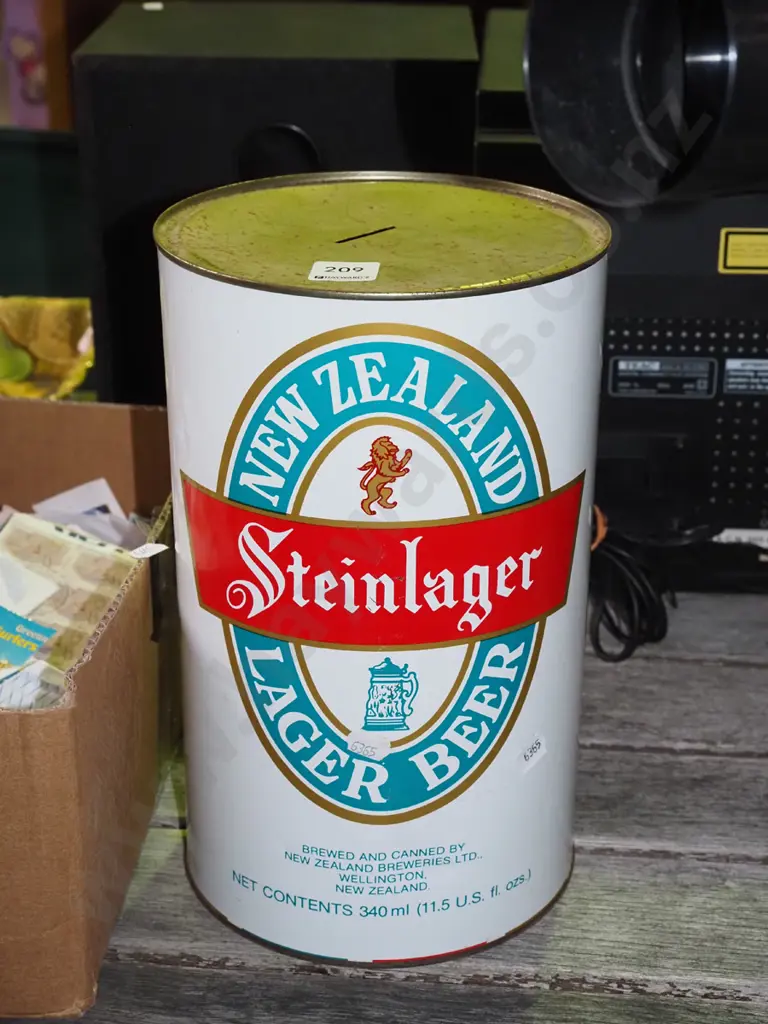 Steinlager beer can money box with some coins H-290 Image 1++