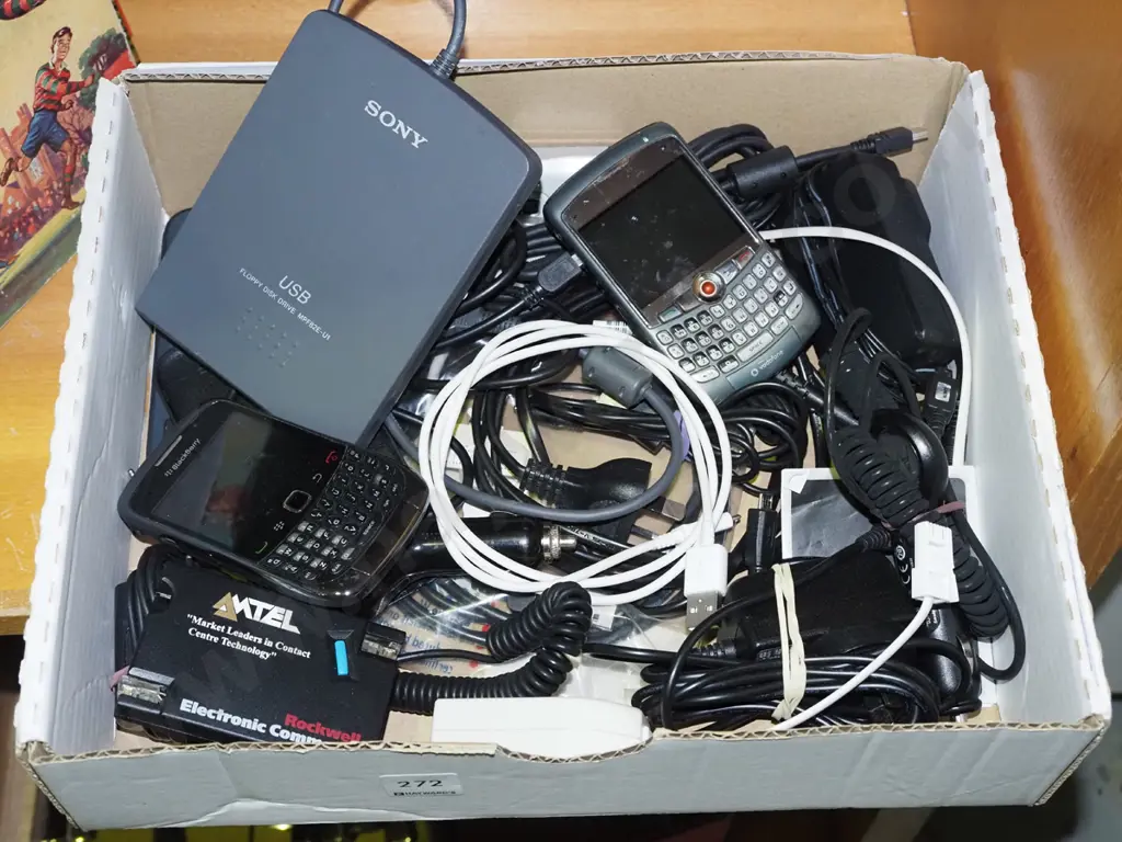 box; blackberry phones, external disc drives, cords etc Image 1++
