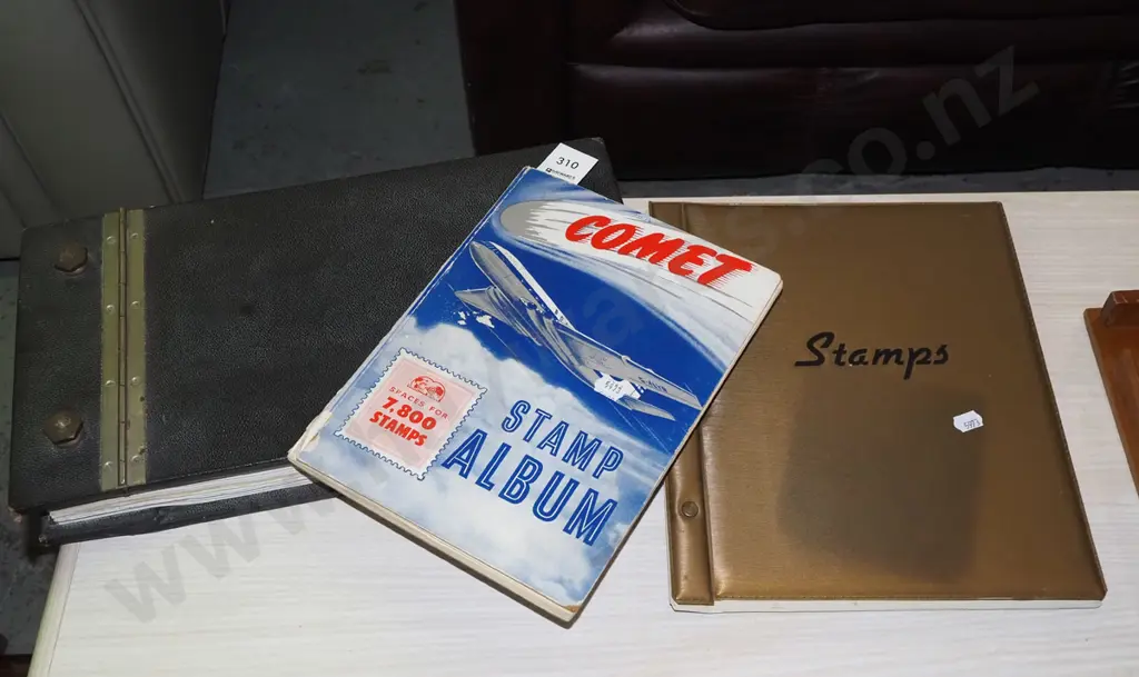 3x stamp albums Image 1++