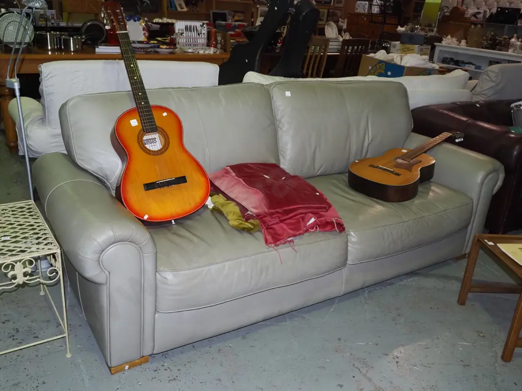 olive leather upholstered rolled arm 3 seater settee Image 1++