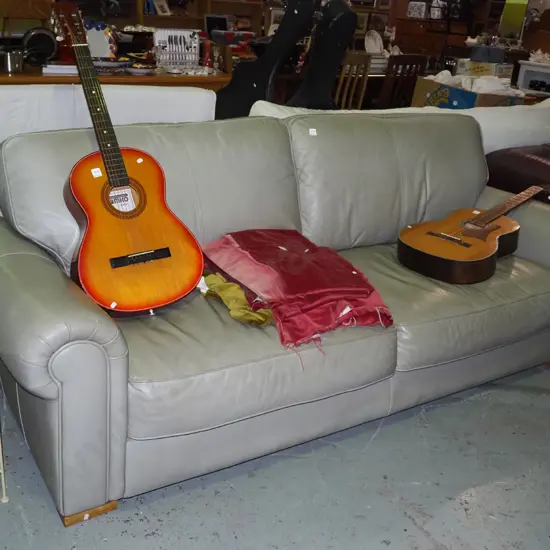 olive leather upholstered rolled arm 3 seater settee