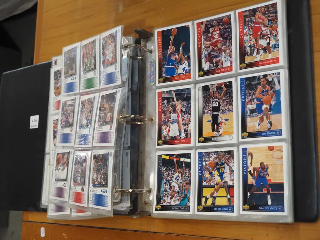 basketball trading cards in album Image 1++