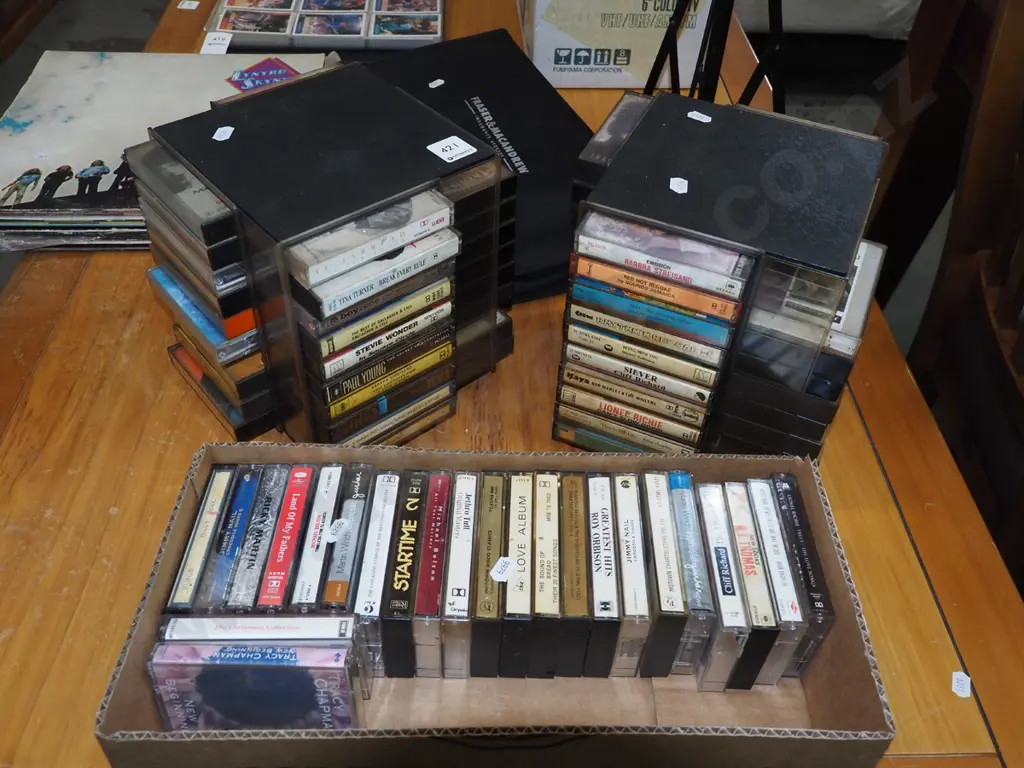 2x small tape cassette towers, box of books Image 1++