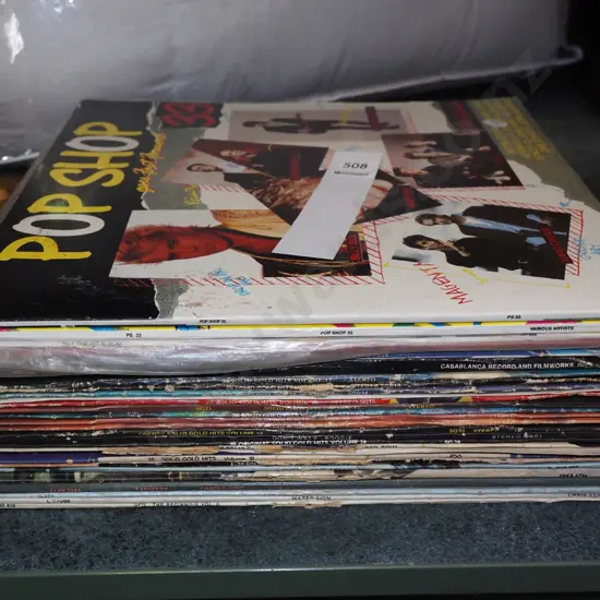 stack of 1980s and other LPs