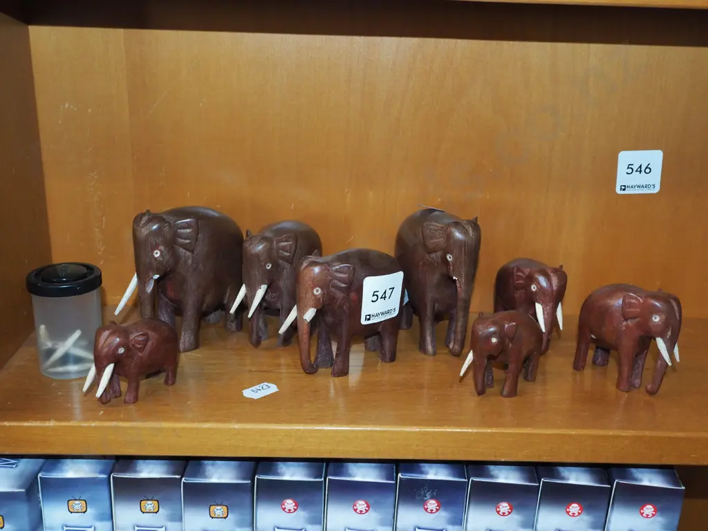assorted carved wooden elephants Image 1++